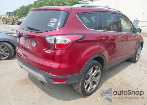 2017 Ford Escape Titanium z USA, uszkodzony, nr VIN 1FMCU0JD2HUA18891